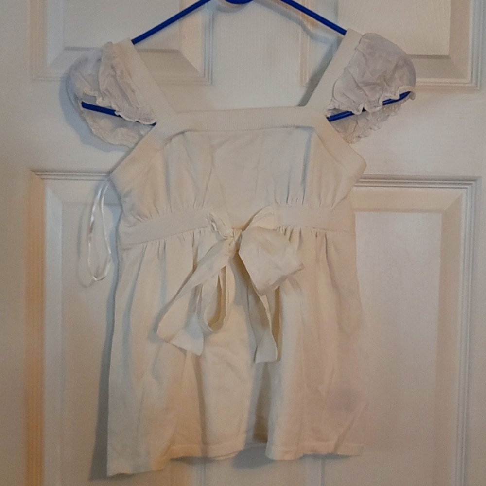 A white guess shirt for girls size 10 12